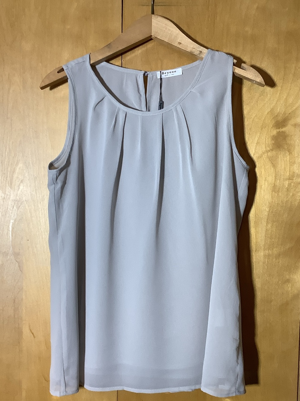 Beyove pale gray sleeveless blouse, size small
